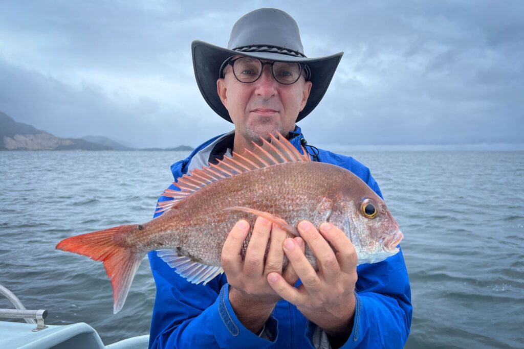 Kure-fishing-boat-caught-a-red-snapper-1024x683