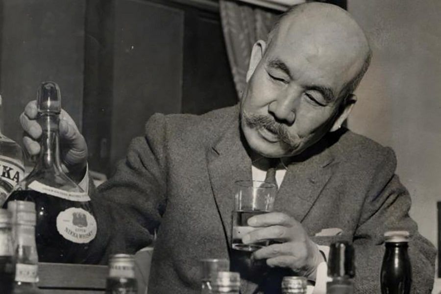 Masataka Taketsuru with bottles