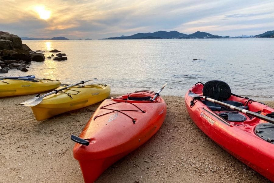 Summer beach sea kayak sunset