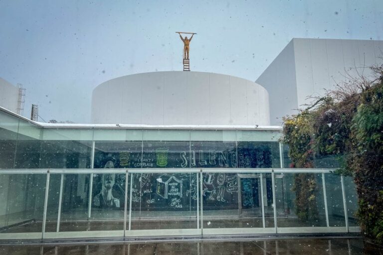 Museum of Contemporary Art golden man on a ladder